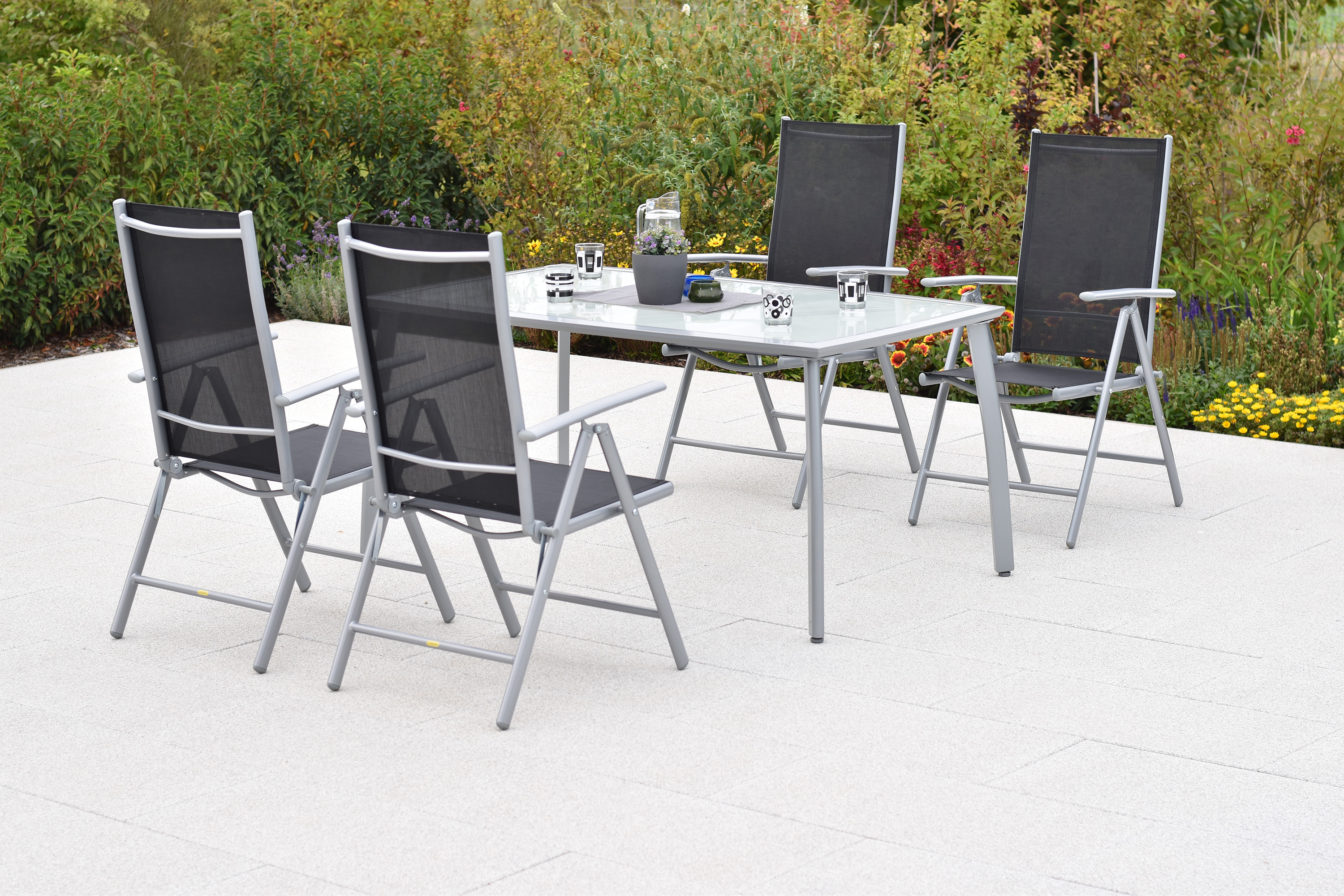 Amalfi Set 5tlg., 4 Klappsessel, Tisch 150x90 cm, schwarz Amalfi Set 5tlg., 4 Klappsessel, Tisch 150x90 cm, schwarz